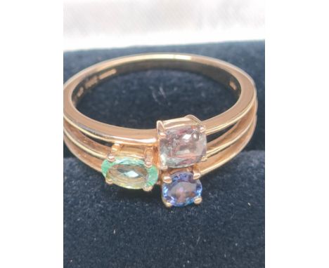 10ct yellow gold ladies ring set with three various gem stones. [Ring size P] [3.32Grams] 