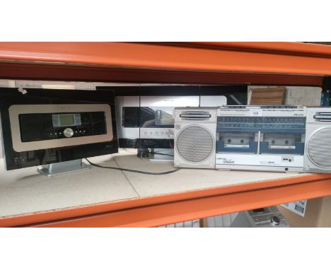 A Philips radio cassette recorder and two Philips wireless music centers 