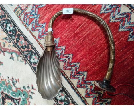 An Antique style brass adjustable wall light 