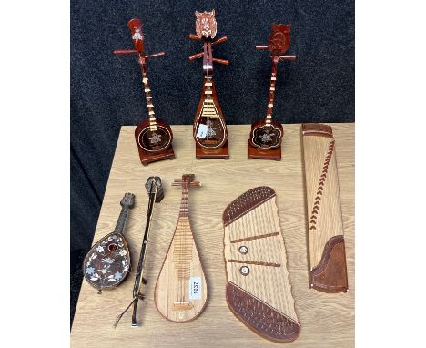 A Selection of miniature model instruments; lap harp/ zither, GuZheng, Pipa and many other Chinese instruments 