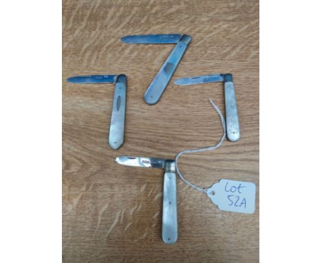 Four Sheffield silver and mother of pearl fruit knives. 