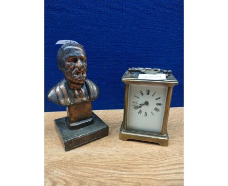 A 19th century brass French carriage clock along with Hippocrates Greek bust 