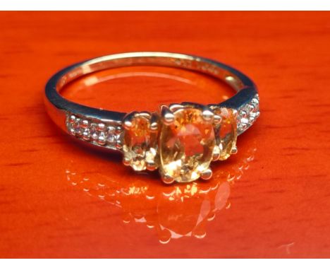 10ct yellow gold ladies ring set with gem stones. [Ring size P] [2.06grams] 
