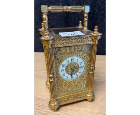19th century brass carriage clock- double barrel movement. Brass and enamel face. 19cm high. 