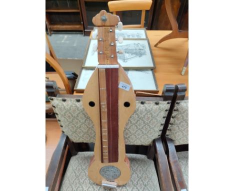 An eastern themed 5 string musical instrument 