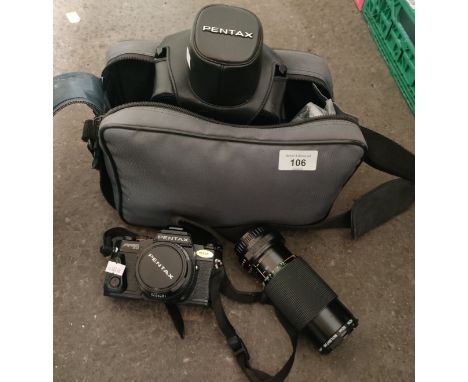 A Pentax Program A camera with lenses and carry case 