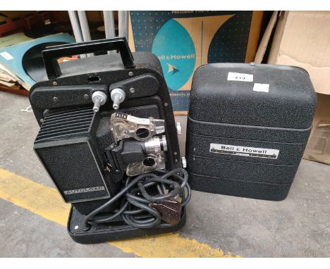 Bell &amp; Howell projector with fitted casing 