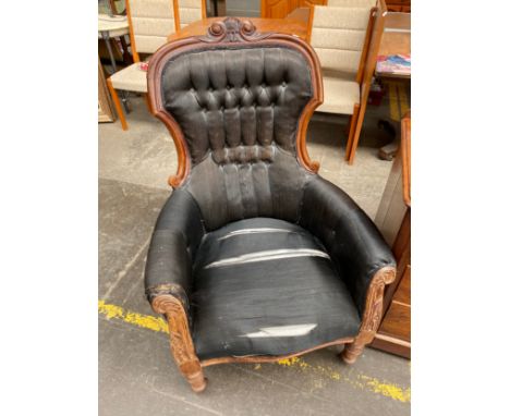 A 19th century button back carved armchair (in need of attention) 