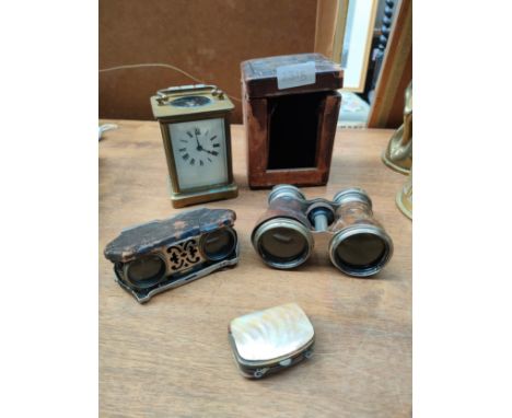 A french brass carriage clock, 2 pair of opera glasses along with small purse and a bone bounded Sewing box 