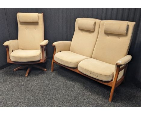 Two seat Ercol reclining settee together with a Ercol reclining swivel chair 