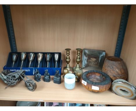 A Shelf collectables to include Isle of man style chess pieces, brass ware &amp; industrial style motorcycle model 