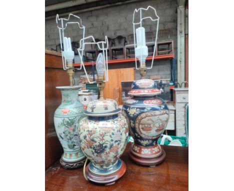 A collection of 3 oriental table lamps to include warrior foliage scene lamp 