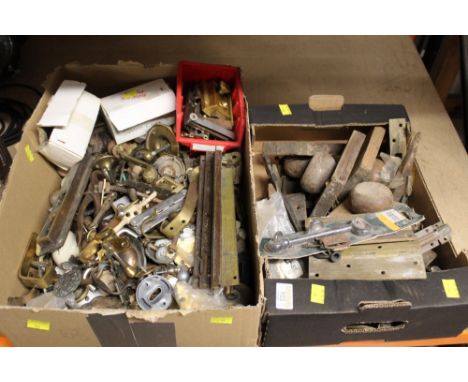 Two boxes of door furniture, drawer handles, locks, bolts, doorknobs, escutcheons etc