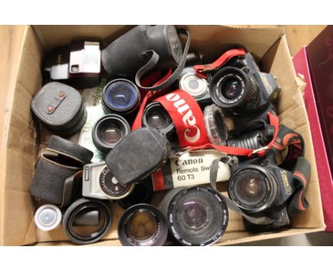 Two Cannon T70 cameras, lenses, camera flash, light meters, etc. 
