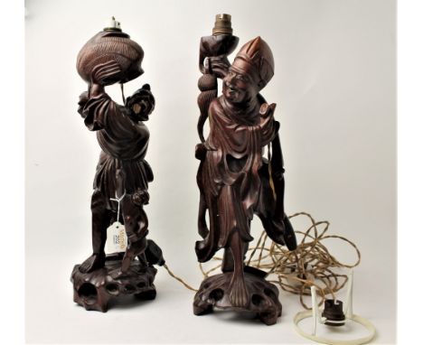 Pair of Chinese carved hardwood lamp bases, height 43 cm