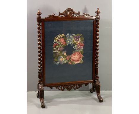 CARVED MAHOGANY FIRESCREEN with barley twist side supports, 110cms H, 76cms W