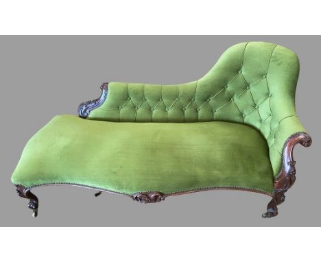 EDWARDIAN CHAISE LONGUE - fine example, on carved supports, upholstered in green dralon and button backed, 90cms H, 177cms W,