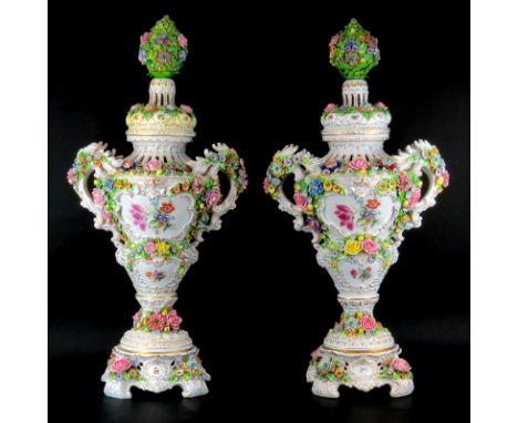 Pair of Monumental Antique Sitzendorf Hand Painted Porcelain Covered Urns.  Decorated with hand painted floral motif on white