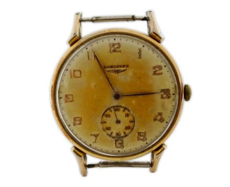 Man's Vintage Longines Gold Tone Metal Watch with Manual Movement. Case measures 35mm. Rubbing and wear to case, discoloratio