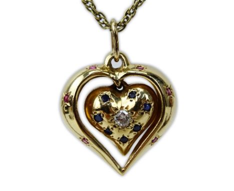 Vintage 14 Karat Yellow Gold Heart Pendant Necklace, the Heart Pendant accented with a Round Brilliant Cut Diamond, Rubies an