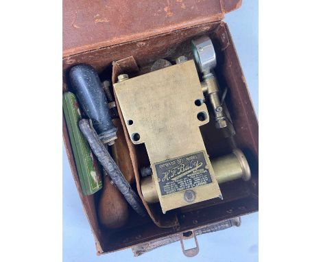 A Harley Frost &amp; Co Ltd of London H.F. Baby Vulcanizer tyre kit, in brass with pressure gauge, in fitted box