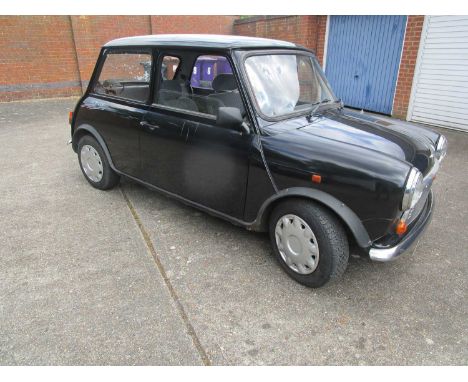 A 1994 Mini Sprite 1275ccRegistration No. L542 MURChassis No. SAXXMYADBBD085865Engine No. 12A2BG03288698Odometer 55840In blac