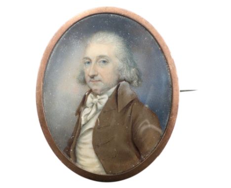 λEnglish School Late 18th Century Portrait miniature of a gentleman, wearing a brown coat and white waistcoat Oval, in a gilt