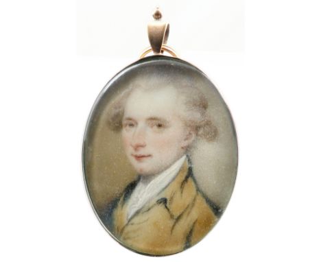 λEnglish School 18th Century Portrait miniature of a gentleman, in a brown coat and powdered hair Oval, in a gilt metal frame