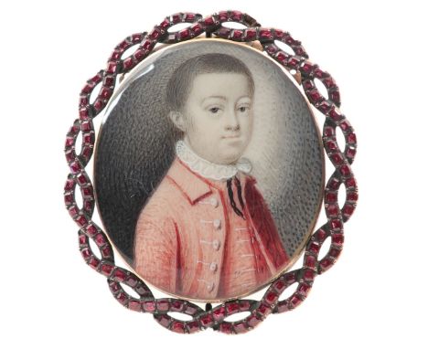 λEnglish School Late 18th Century Portrait miniature of a boy, wearing a red coat and waistcoat Oval, in a gilt metal brooch 