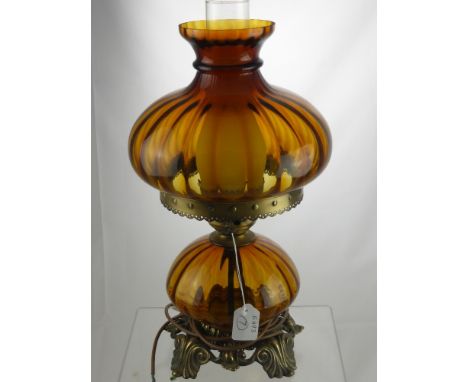 A Victorian Amber Glass Oil Lamp, wired for conversion. 