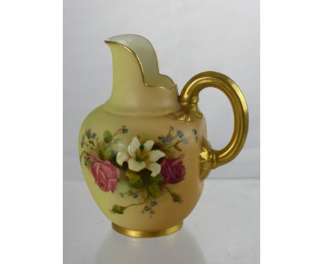 A Royal Worcester Blush Ware Jug, having a gilded handle, hand painted with a floral spray, nr 1094.
