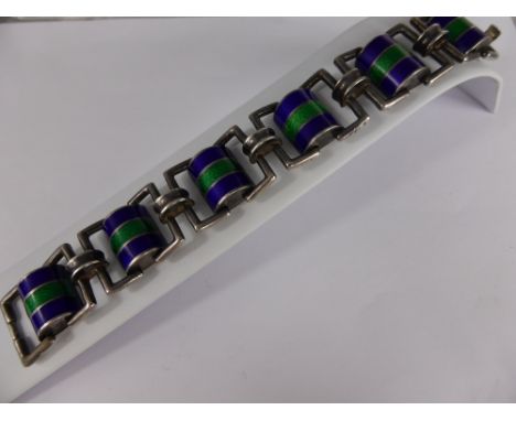 A Vintage Continental Bespoke Silver and Enamel Bracelet, the bracelet of geometric design having domed sapphire and emerald 