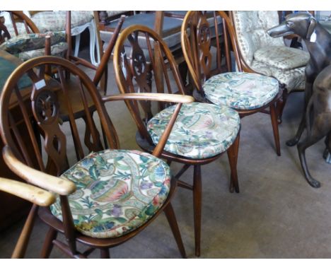 Four Ercol Kitchen Chairs, and two carvers, all with Sanderson Cascacs fabric covered cushions. (6)