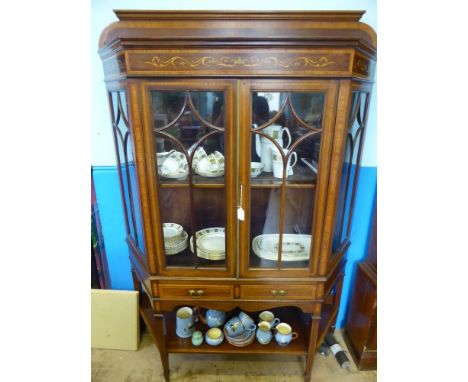 An Inlaid Edwardian Display Cabinet, the cabinet has glazed front with two central drawers and a shelf beneath, with decorati