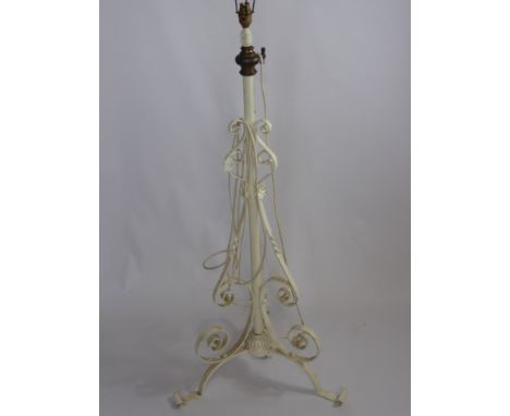 A White Painted Wrought Iron Lamp Stand on tripod base approx 131 cms overall length. 