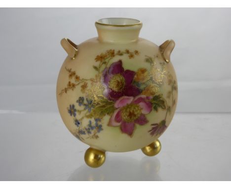 A Royal Worcester Blush Ware Vase, of bulbous design supported on gilded ball feet hand painted with wild flowers, nr 415 to 