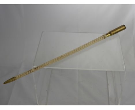 A Pre 1947 Ribbed Ivory Swagger Stick, having a .43 calibre rifle shell as handle with brass bullet tip, approx 50 cms in len