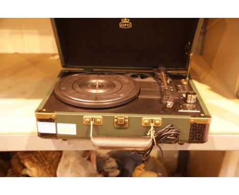 Green GPO Ambassador briefcase 3 speed record player USB recorder; built in twin stereo speakers; Bluetooth transmitter; buil