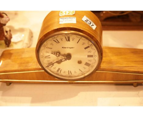Kieninger wooden cased mantel clock. Not available for in-house P&P.Condition Report: Good condition but no key.