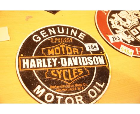 Cast iron Harley Davidson Oil sign, D: 24 cm. P&amp;P Group 2 (£18+VAT for the first lot and £3+VAT for subsequent lots) 