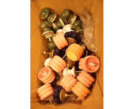 Box of vintage ceramic, plastic and glass drawer knobs. Not available for in-house P&amp;P. 