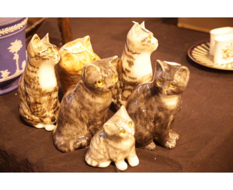 Collection of signed ceramic cat figurines. Not available for in-house P&amp;P. 