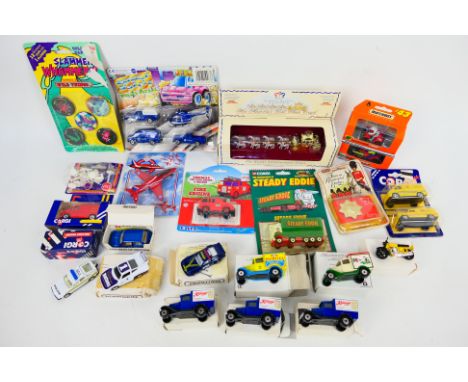 Corgi - Matchbox - Siku - Ertl - A group of boxed / carded models including Matchbox Wrangler Porsche 911, Corgi Austin Metro