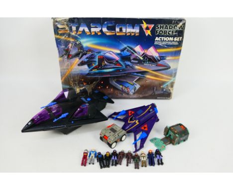 Mattel - Coleco - Starcom - A boxed Starcom Shadow Force Action Set. The set comes with several vehicles, and a group of 11 a