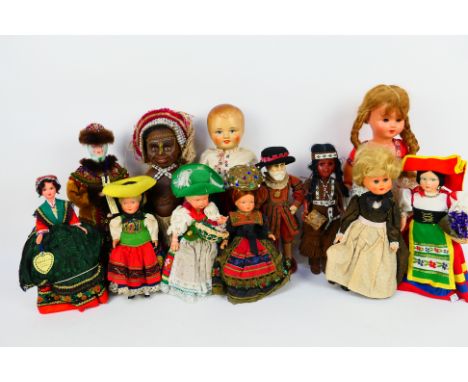 Netta - Molls Doll - Other - An unboxed group of 12 collectable dolls, most around 12" in height  (some under) made from a va