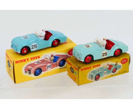 Dinky - Atlas - A boxed Triumph TR2 Sports in turquoise # 111 which appears in Near Mint condition in a Fair to Good box with