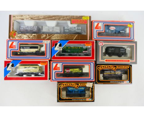 Hornby - Bachmann - Lima - Mainline - Dapol - Nine boxed OO gauge wagons. Lot includes Lima 50T Stone hopper wagon 'Tarmac'; 