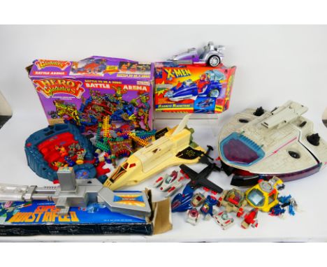 Tyco - Bluebird - Fisher Price - A group of boxed and unboxed vintage toys, action figures and an action figure playset. Lot 