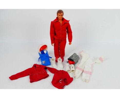 Kenner - An unboxed vintage Kenner 'Six Million Dollar Man' together with a small group of accessories which includes engine 