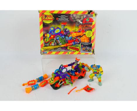 Playmates - Toxic Crusaders - A boxed Playmates #2502 Toxic Crusaders 'Smogcycle'. The item has some play wear and has a brok